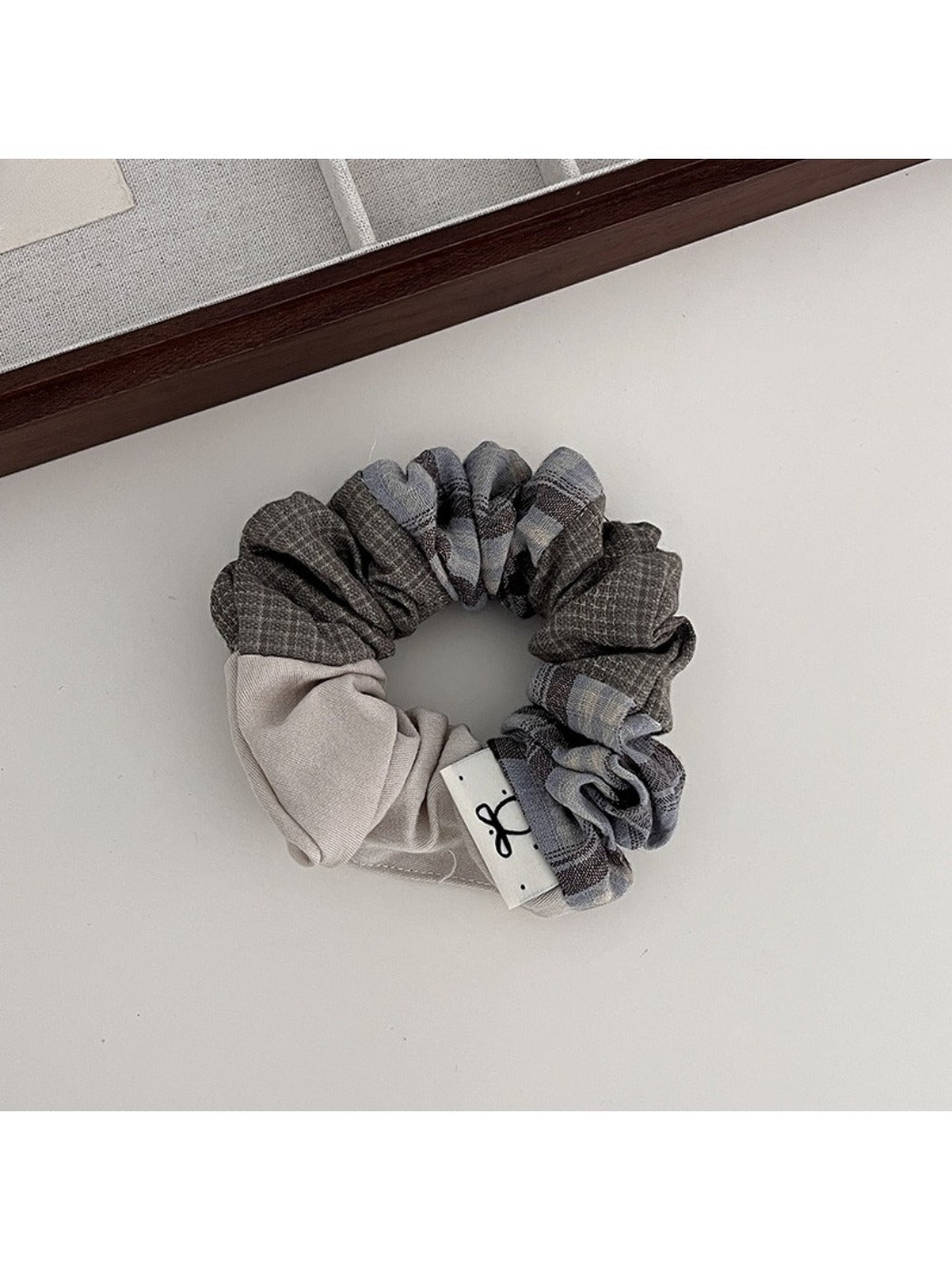 Gifty vintage patchwork plaid scrunchie worn in a ponytail