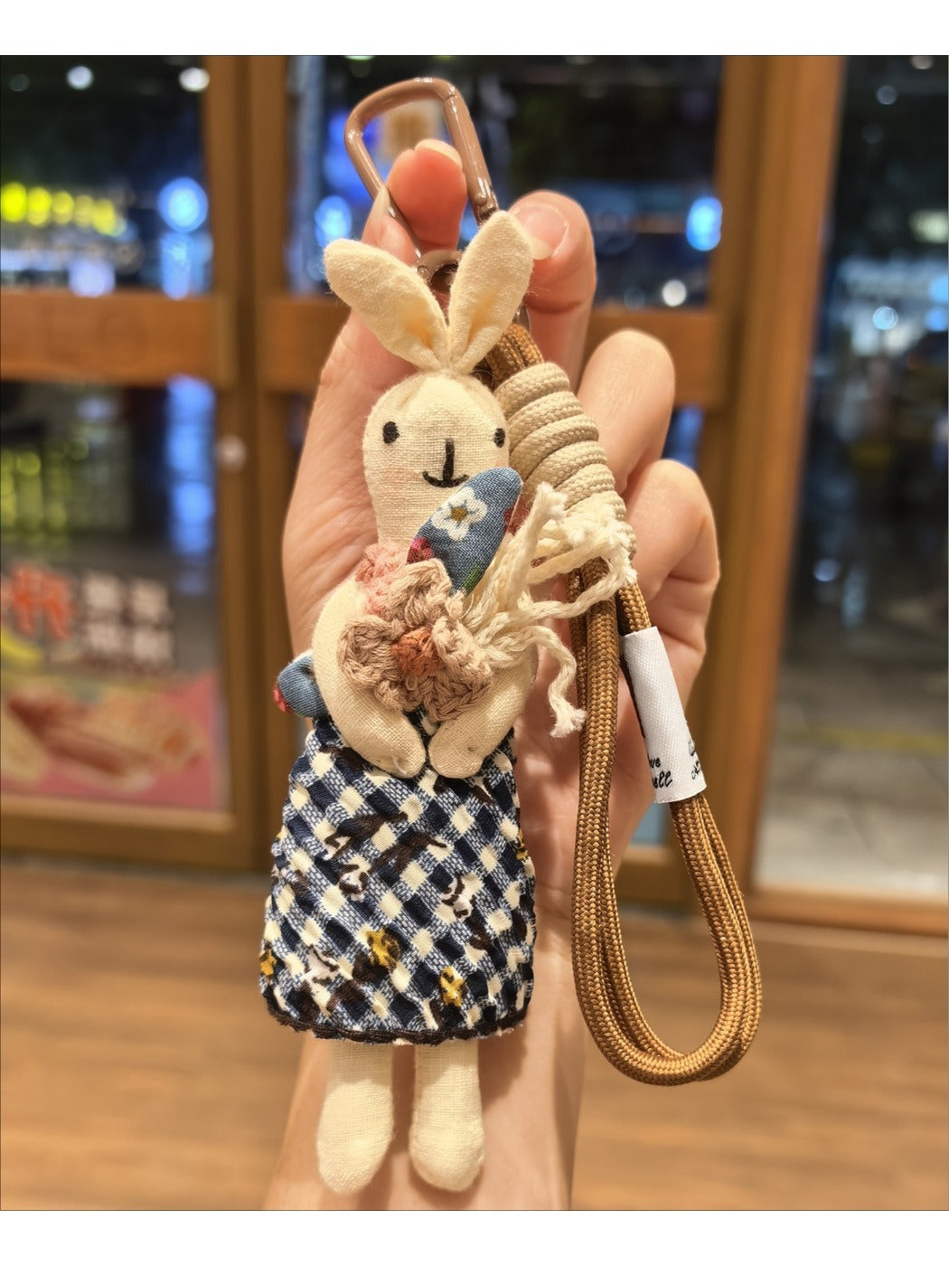 Fabric rabbit keychain displayed on a white background with clear lighting