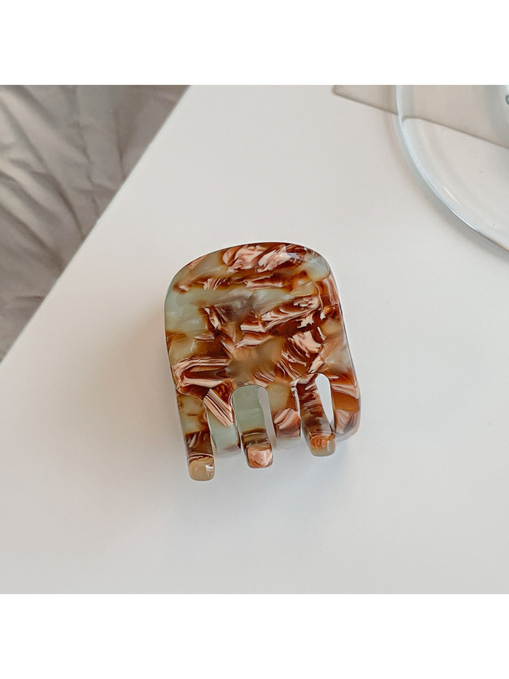 Beau acetate hair clip shown from angled perspective to showcase shape and finish