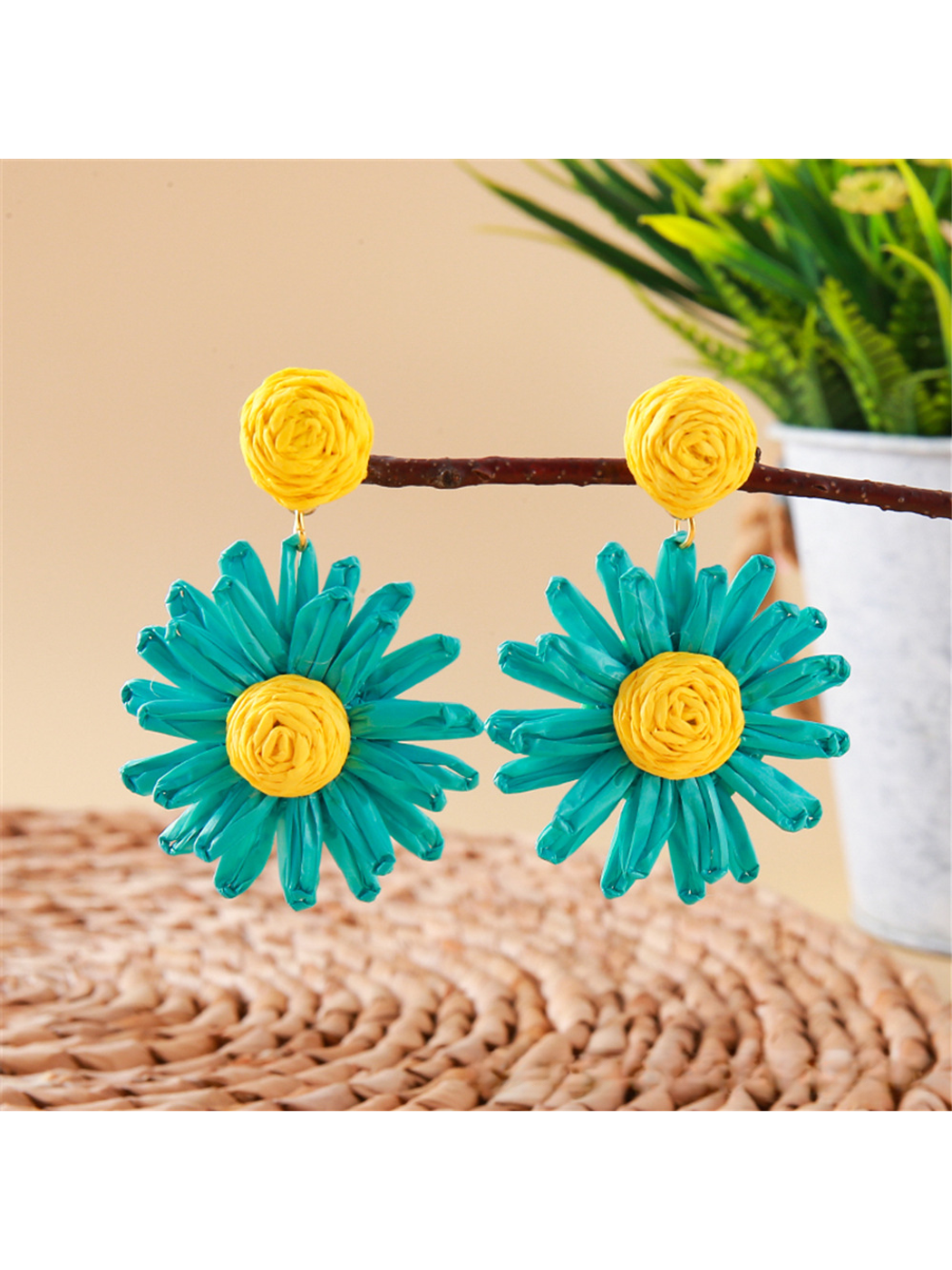 Earedge Bohemian daisy floral raffia stud earrings shown with matching accessories