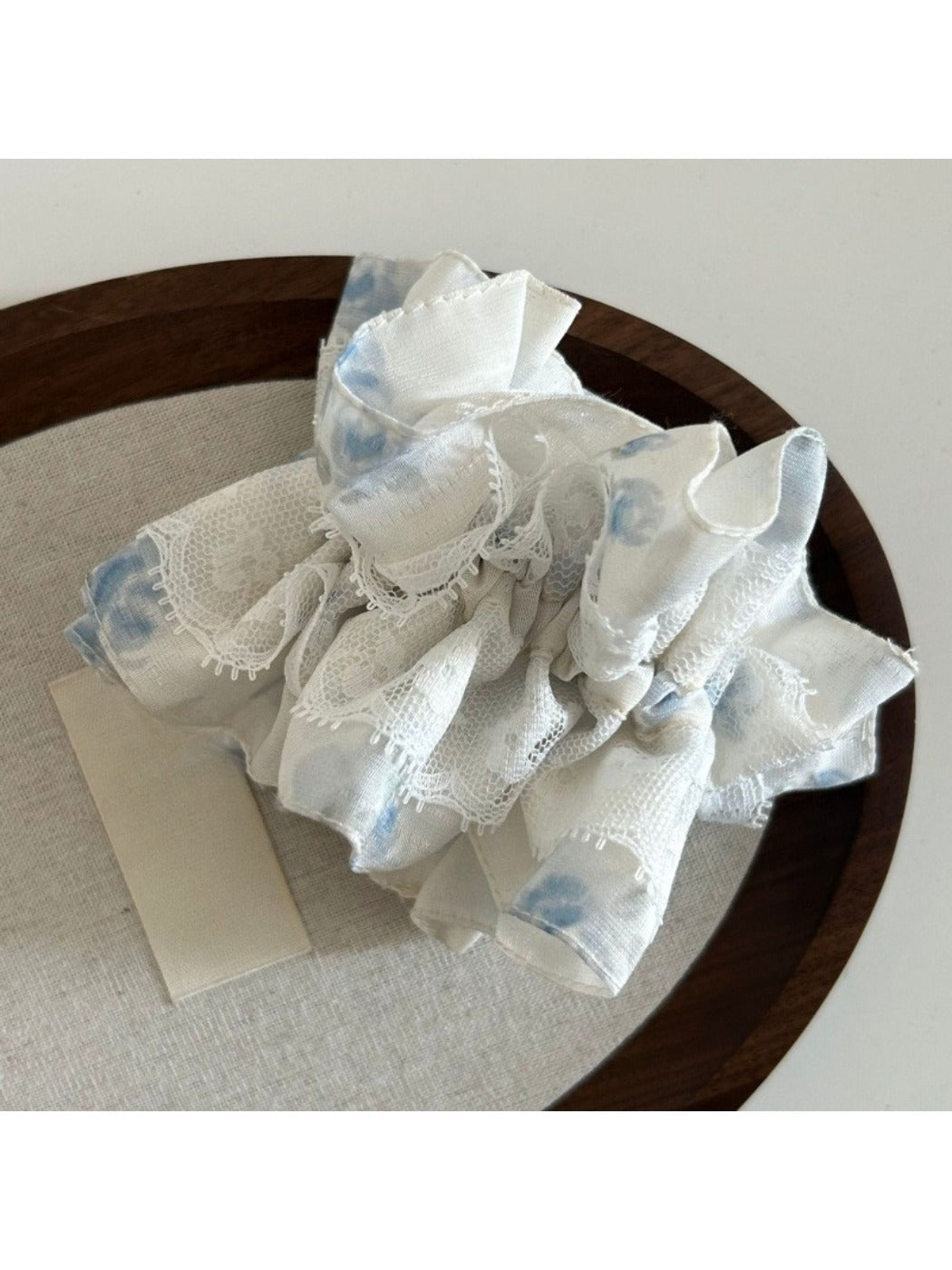 Gifty Sweet Lace Tiny Floral Scrunchie folded to display lace trim and floral design