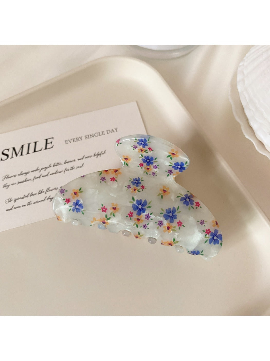 Beau half moon hair claw clip open showing spring mechanism