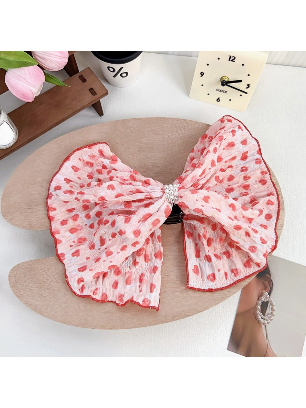 Beau Polka Dot Bow Claw Clip with focus on bow and clasp mechanism