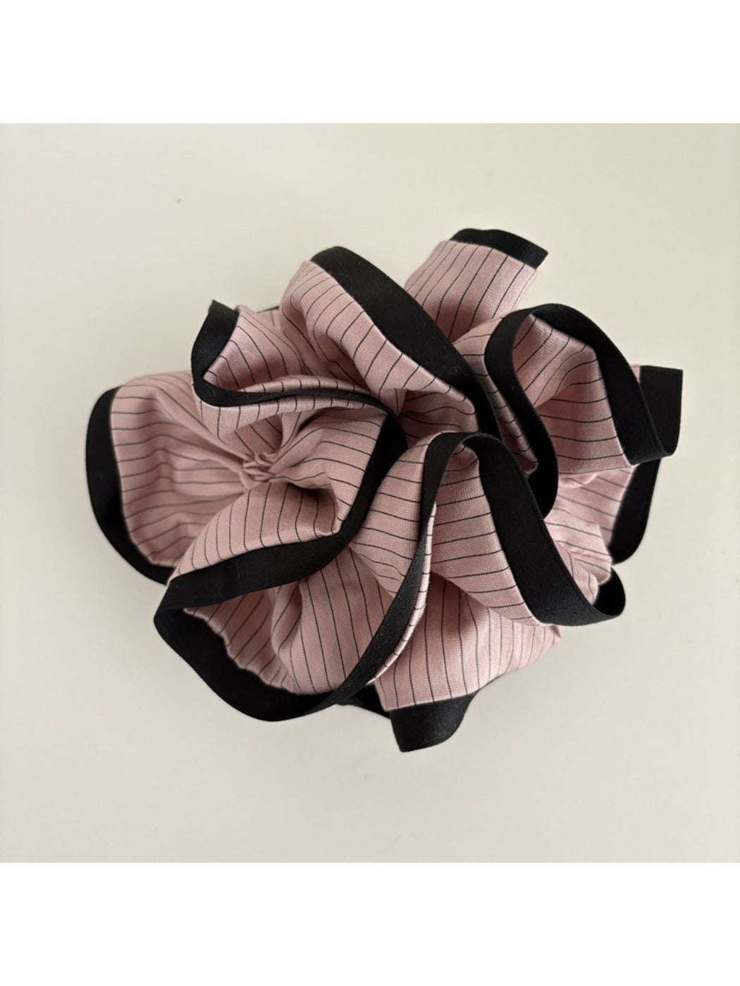 Multiple Gifty Neat Silky Zesty Scrunchies stacked to show consistent color and texture