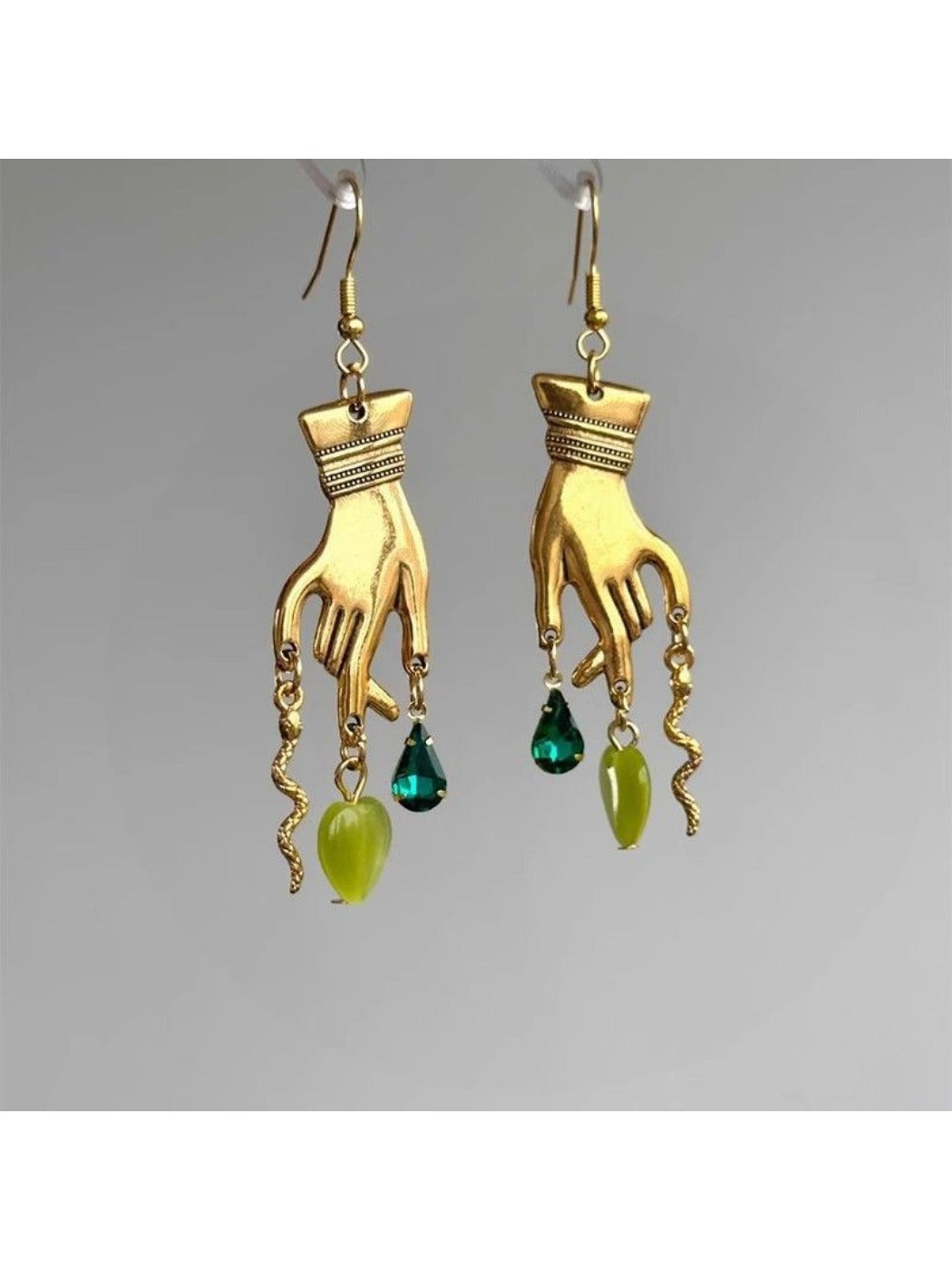 Earedge Magic Hand Pendant Earrings shown from a side angle highlighting details
