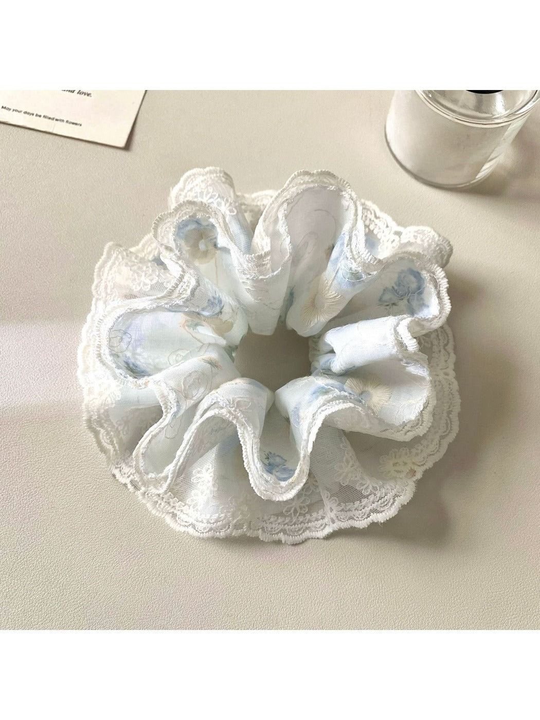 Gifty scrunchie paired with casual outfit, emphasizing its modern and minimalist style