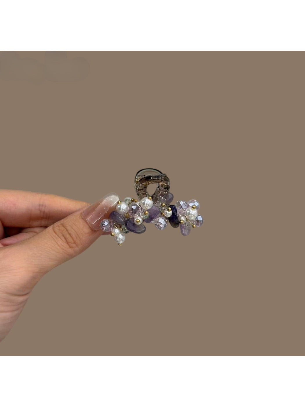 Side view of Beau bright pretty hair clip displaying its curved design and clasp mechanism