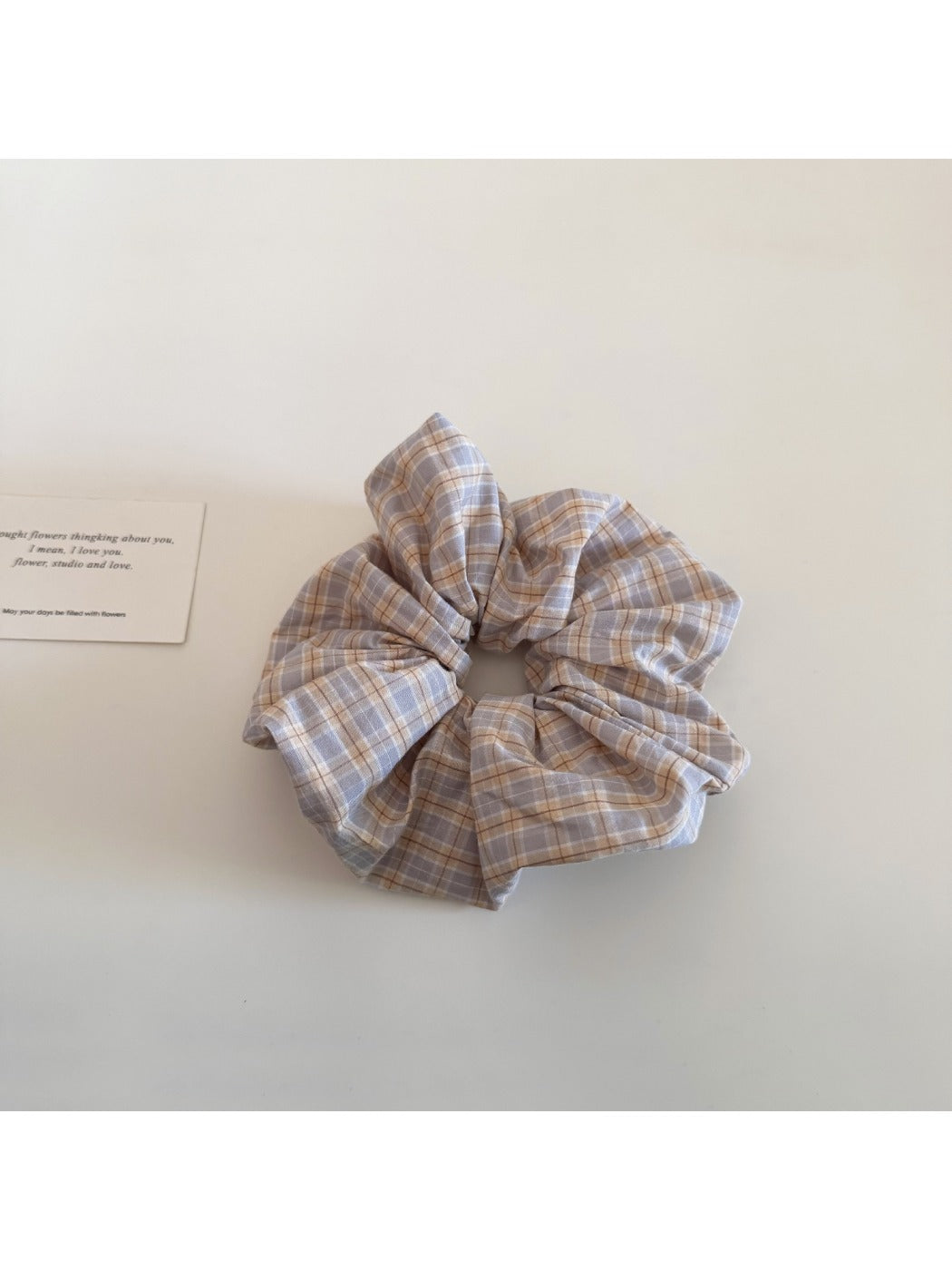 Gifty scrunchie wrapped around a wrist as a fashion accessory