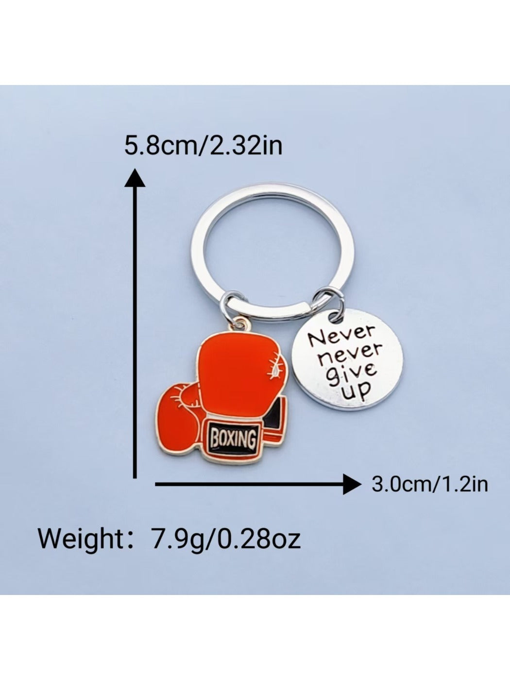 Boxing glove keychain hanging from a backpack zipper pull