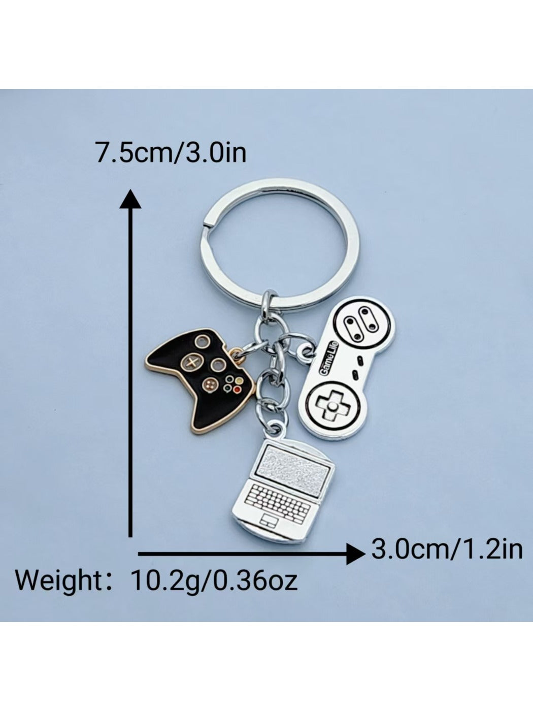 Keypus game controller keychain displayed on a wooden surface with natural lighting