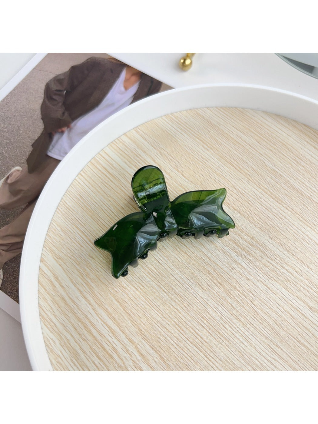 Beau hair claw clip displayed alongside matching pastel hair accessories
