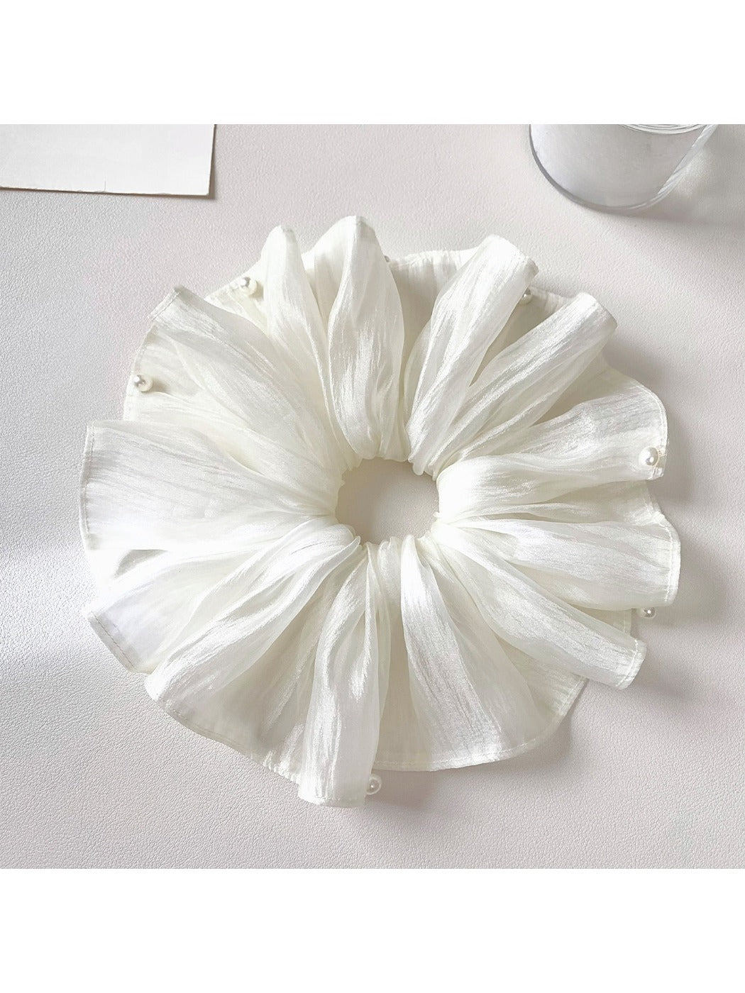 Elegant white tulle scrunchie with gathered fabric detail