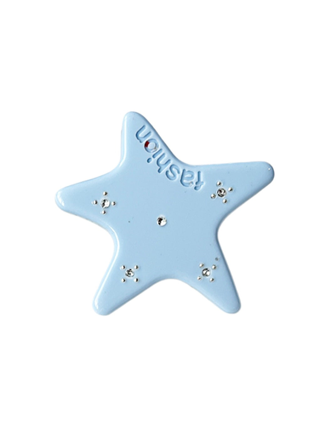 Beau acetate star hair clip held in hand showing size