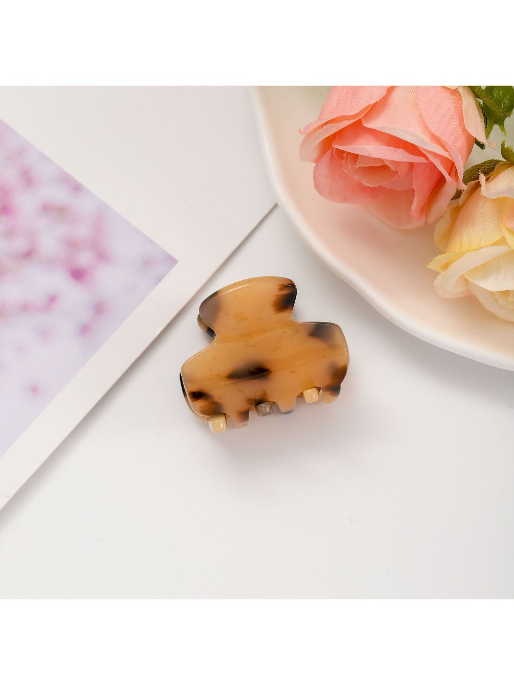 Beau fresh acetate hair clip displayed alongside matching hair accessories