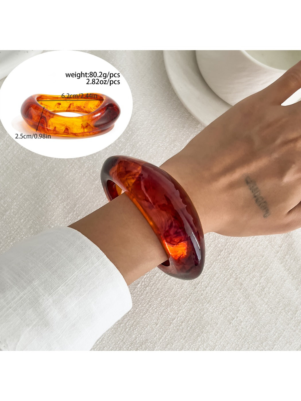 Lovra vintage polished irregular bangle bracelet styled with casual outfit