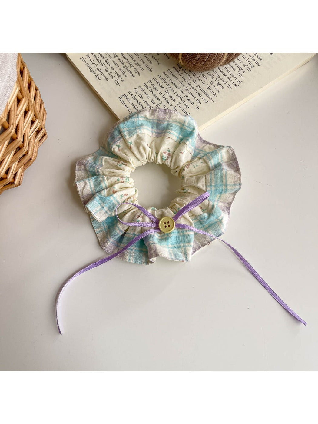 Gifty scrunchie headband wrapped around a wrist as a fashion accessory
