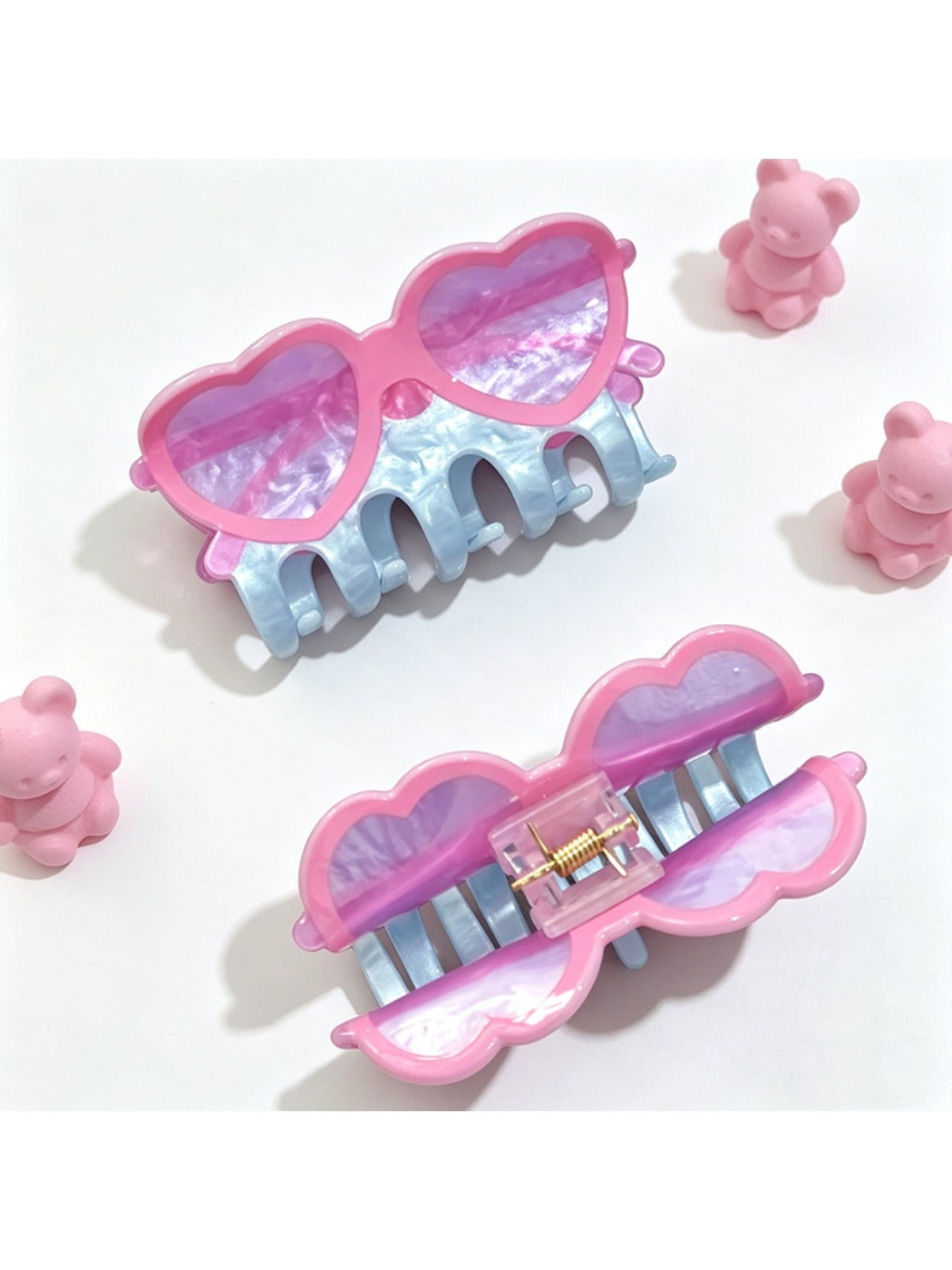 Beau claw clip shaped like eyeglasses holding hair in a bun