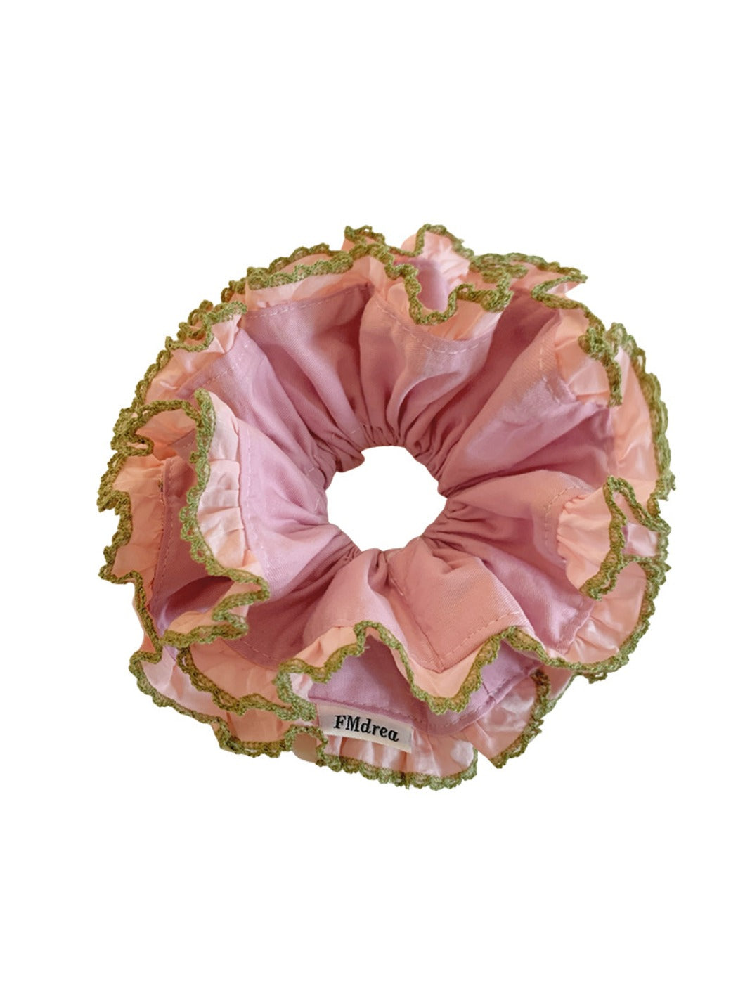Pink double scrunchie with lace trim wrapped around a wrist