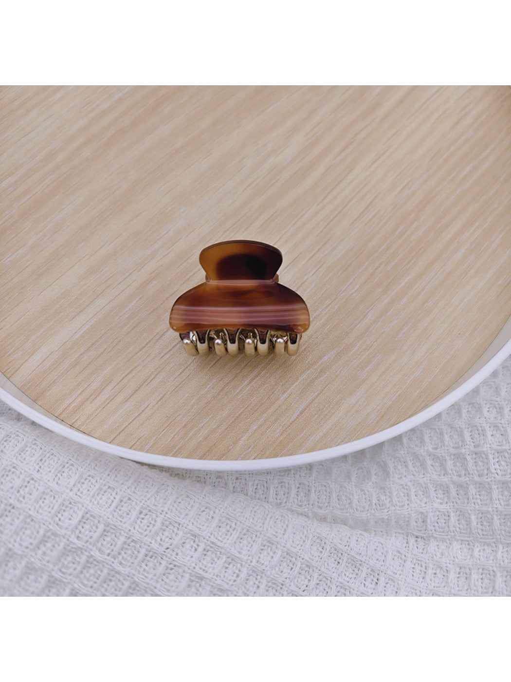 Beau medium half ponytail claw clip displayed with packaging box