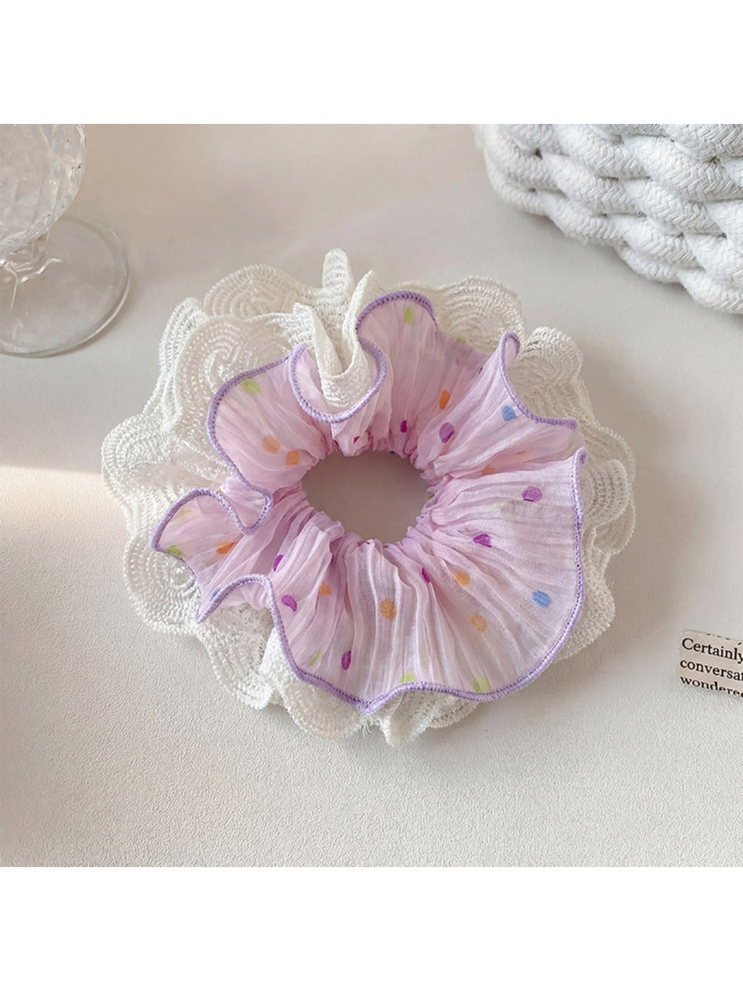 Gifty polka dot ruched scrunchie in black and white shown with matching hairpins