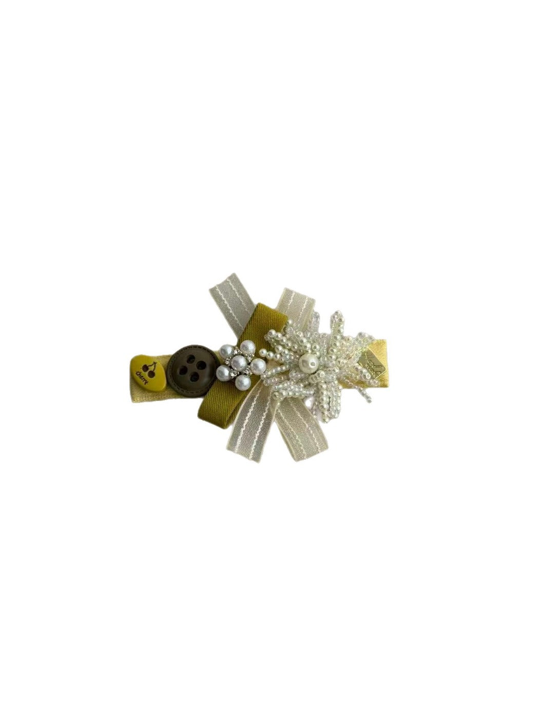 Close-up of Beau Sweet Tulle Bow Hair Clip showing delicate tulle fabric and clip mechanism