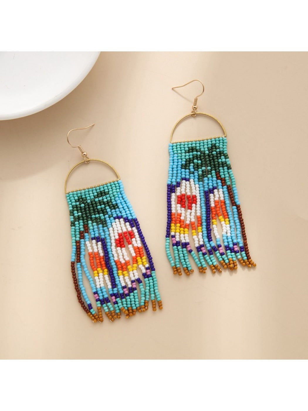Earedge - Long Animal Shaped Tassel Earrings