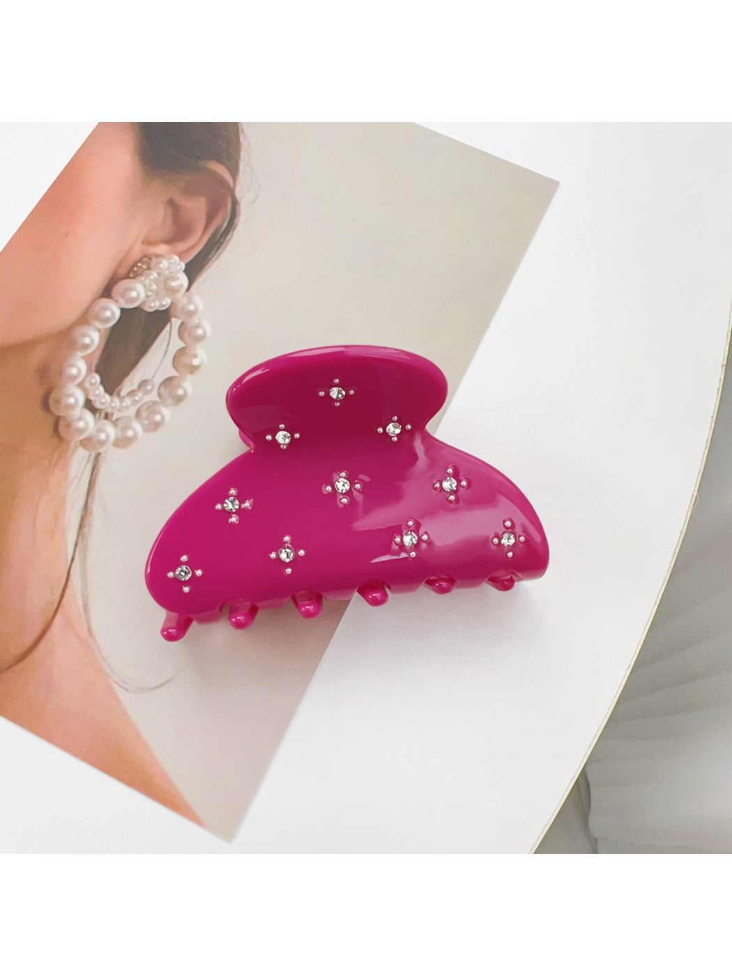 Beau chic crescent hair claw clip styled in a low bun hairstyle