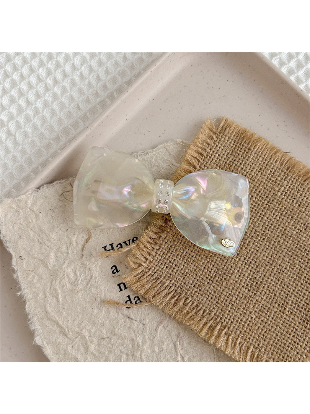 Beau - Marbled Acetate Bow Spring Hair Clip