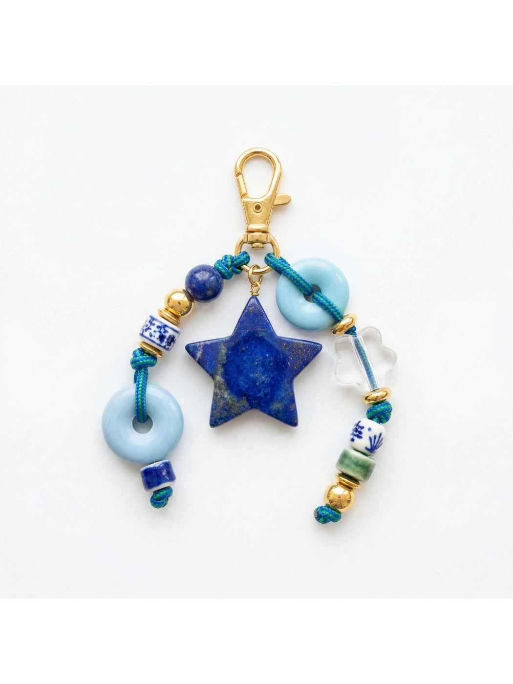 Vintage beaded keychain displayed on a white background highlighting colors and texture