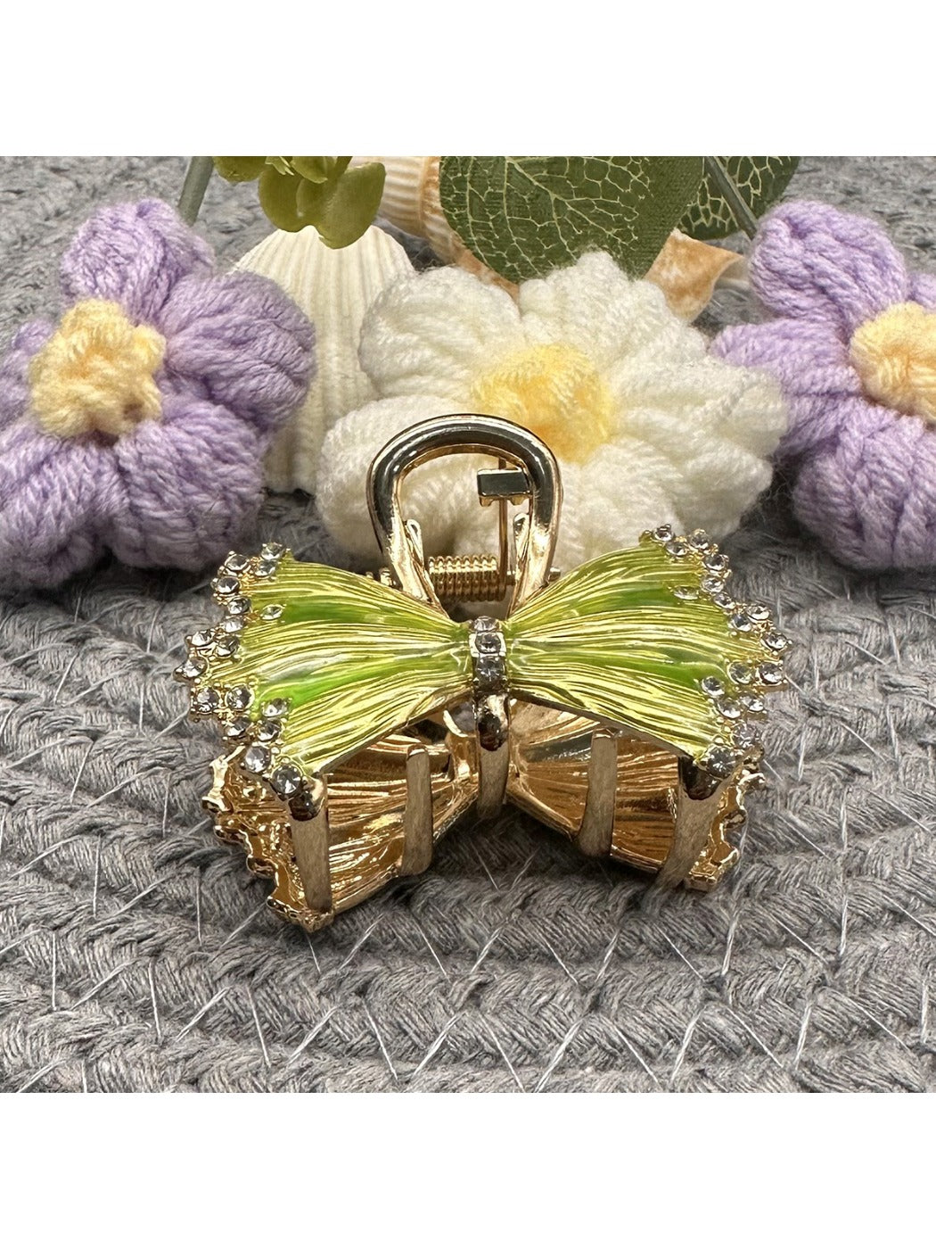 Beau hair clip displayed on white background showing full bow design