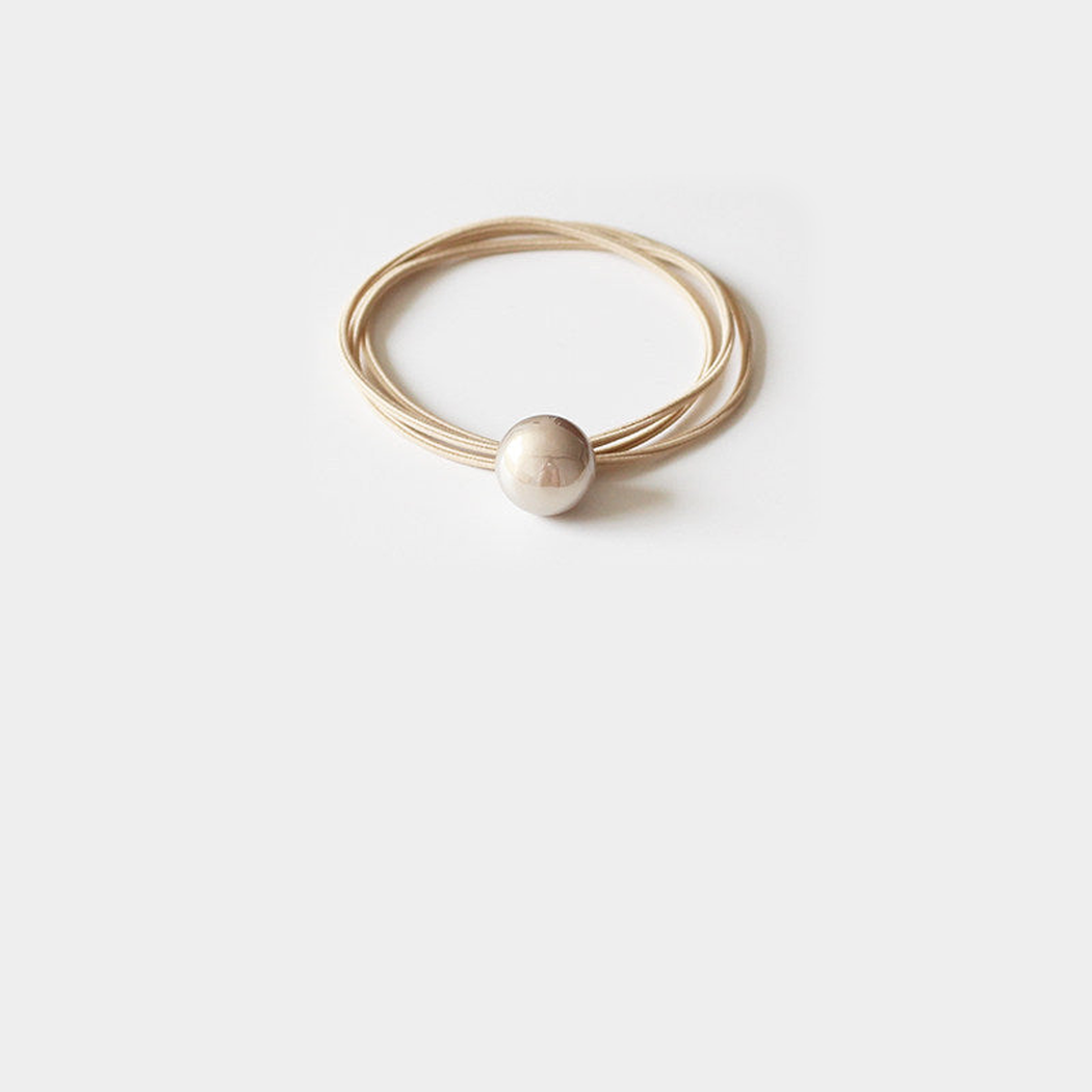 Ivory Gifty - Round Pearl Bead Hair Tie on neutral background