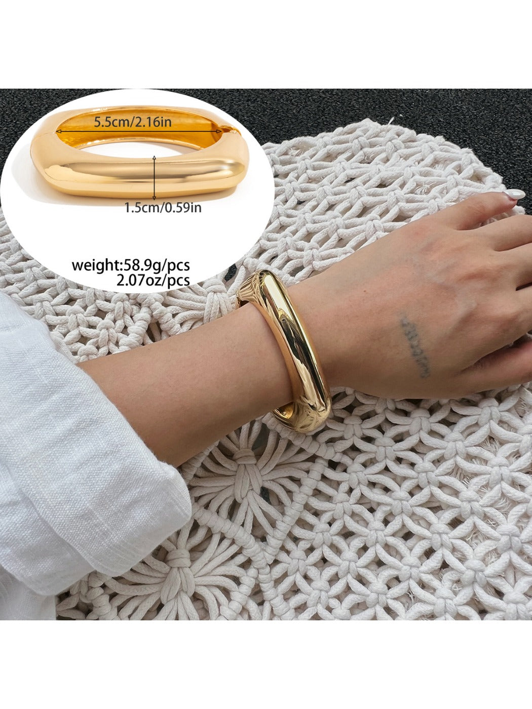 Lovra vintage wide irregular shaped bangle bracelet displayed with natural lighting