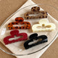 Beau - Tortoiseshell Openwork Hair Claw | primary max variant coverage | source 01