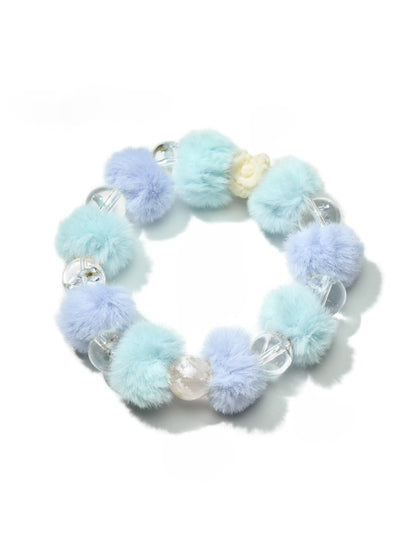 Lovra bracelet worn on wrist featuring small pastel beads and a simple design