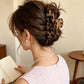Beau - Tortoiseshell Openwork Hair Claw | retained single-variant image | source 02