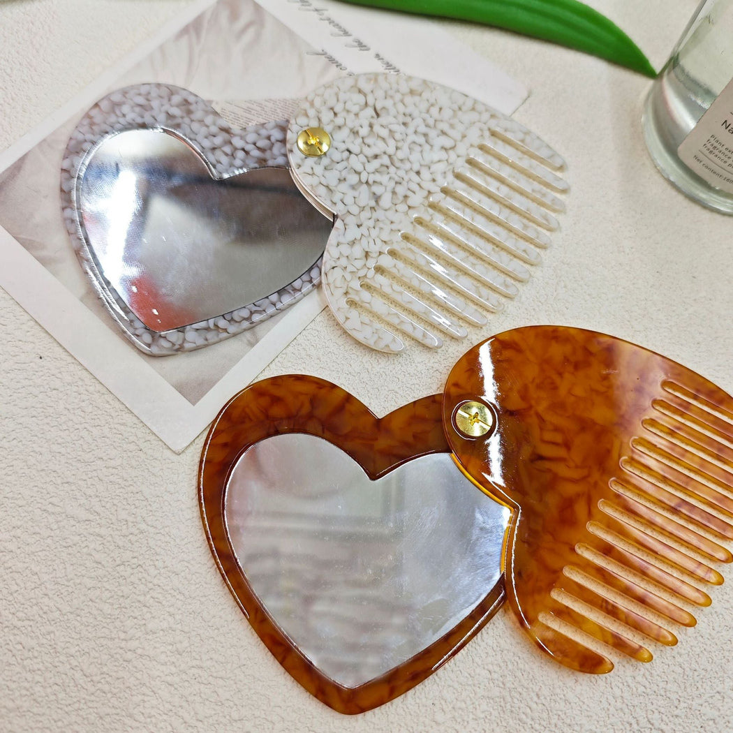 Product view of folding comb and mirror