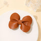 Beau - Solid Bow Elongated Barrette | retained single-variant image | source 03