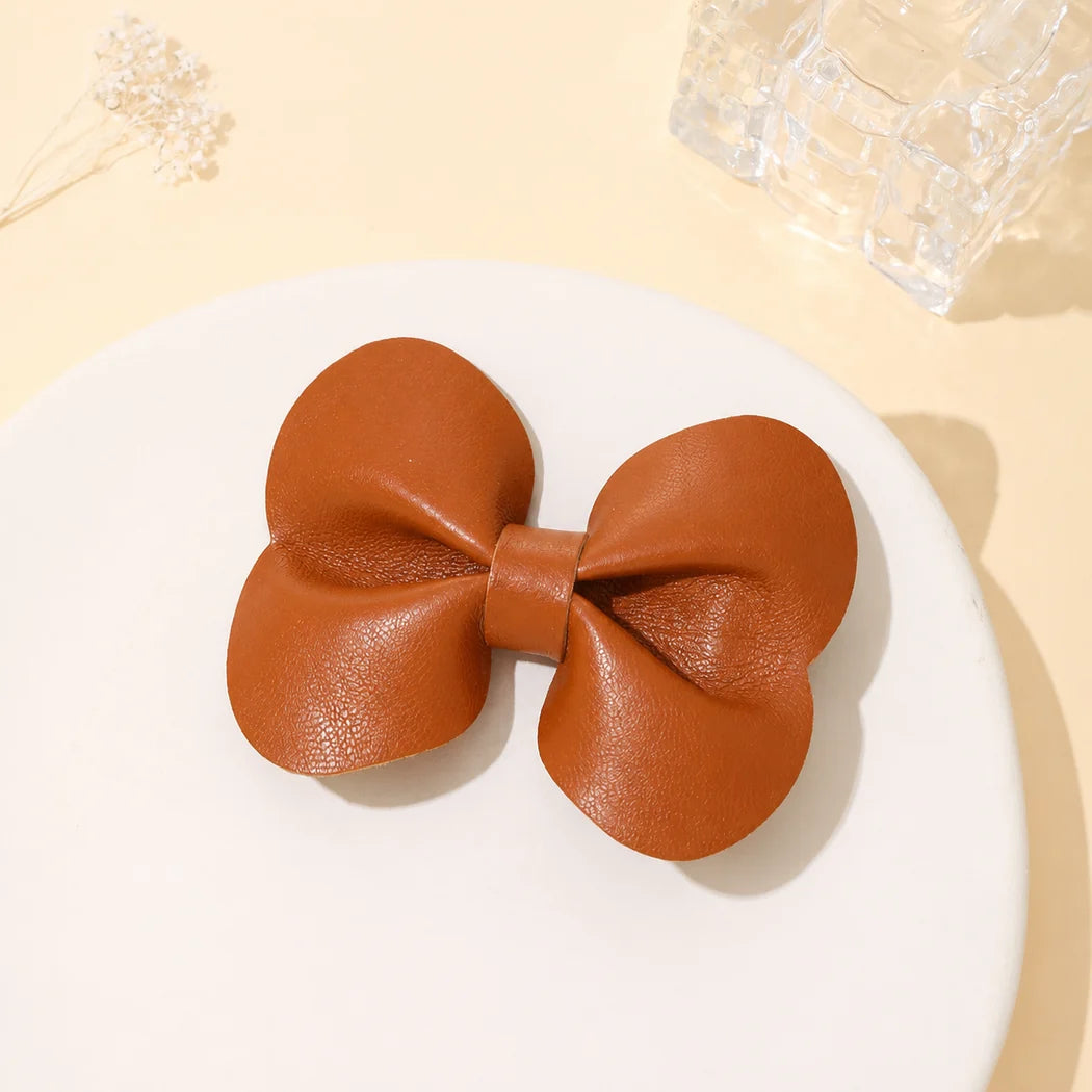 Beau - Solid Bow Elongated Barrette | retained single-variant image | source 03
