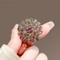Multicolor dandelion brooch, detail view