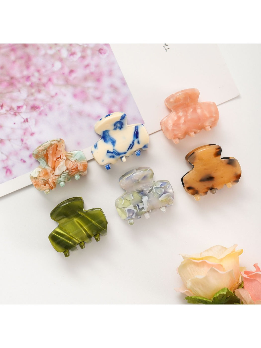 Side view of Beau fresh acetate hair clip highlighting curved design