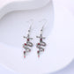 Earedge - Snake Wrapped Cross Drop Earrings, variant view