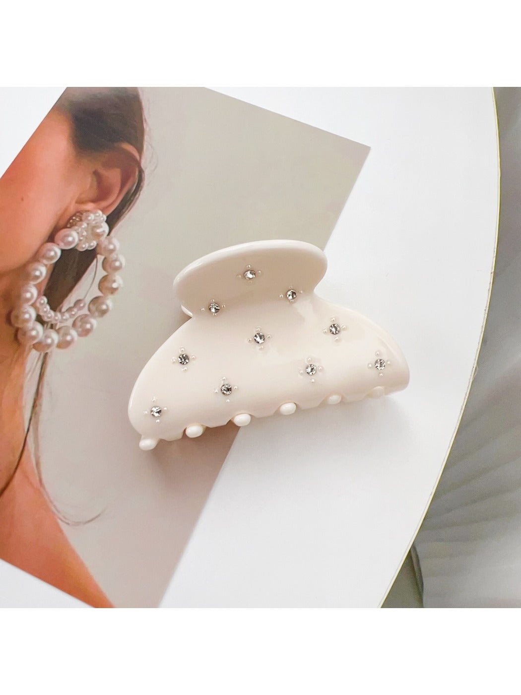 Top view of Beau chic crescent hair claw clip showing smooth curved edges