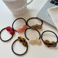 Gifty - Trendy Heart Shaped Acetate Hair Tie