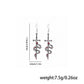 Earedge - Snake Wrapped Cross Drop Earrings, size reference