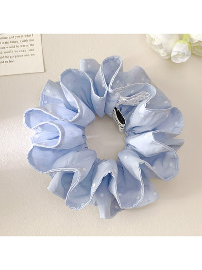 Blue polka dot double layer scrunchie on white background