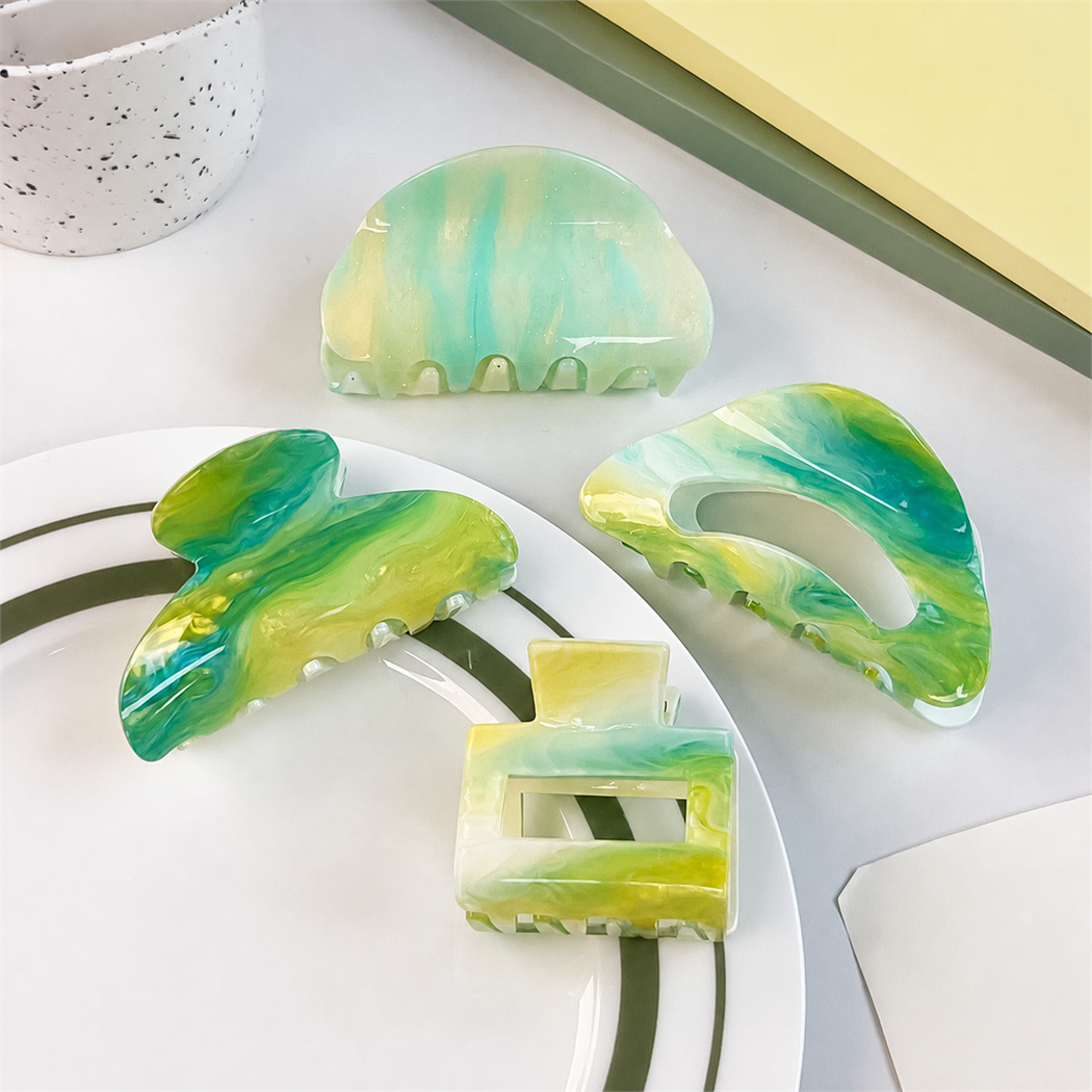 Green marbled geometric hair claws - all variants overview
