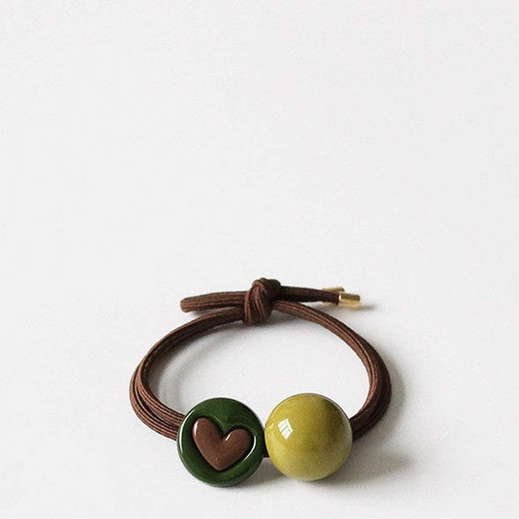 Green Charm Hair Tie Collection showing multiple available variants