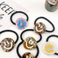 Smiley Charm Hair Tie Collection showing multiple available variants
