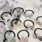 Iridescent Bow Hair Tie Collection showing multiple available variants