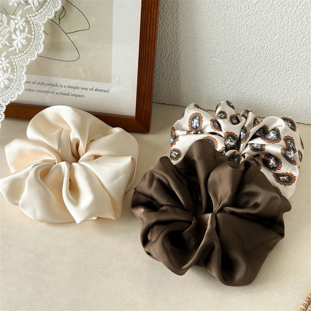 Leopard Glossy Scrunchie Trio showing multiple available variants